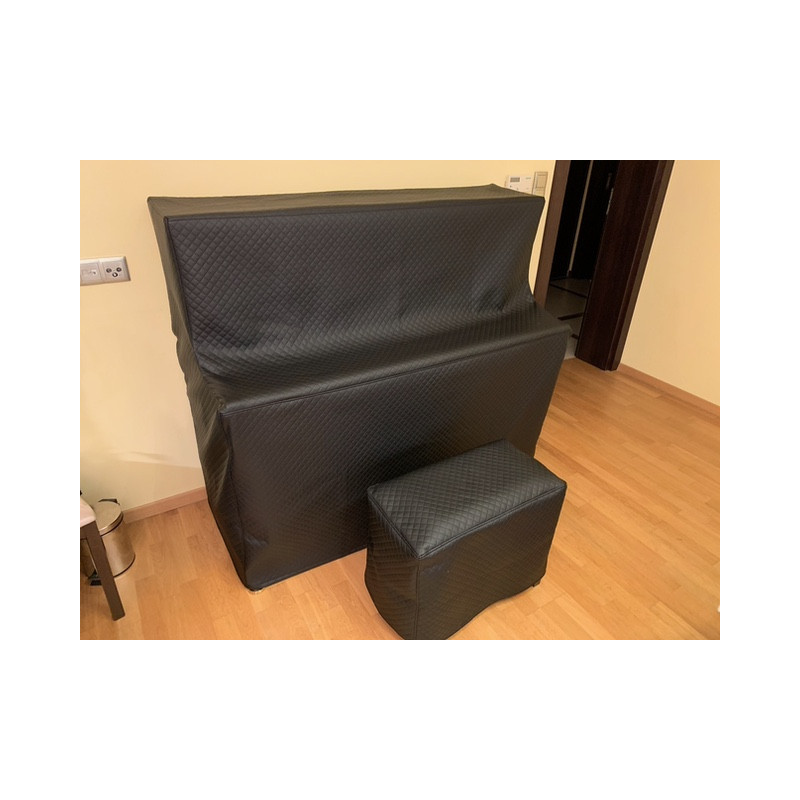 Quilted eco-leather cover for a standing piano